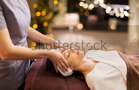 close up of woman lying and having massage in spa Stock photo © dolgachov