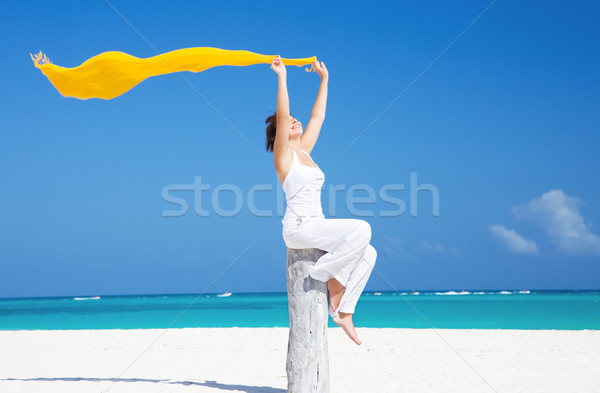 happy woman on the beach Stock photo © dolgachov