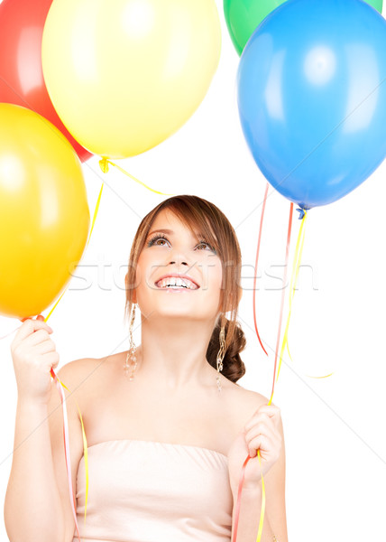 Stock photo: happy teenage girl with balloons
