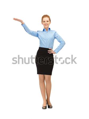 smiling stewardess showing direction Stock photo © dolgachov