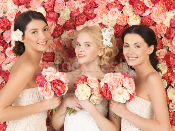 Drei Frauen voll Rosen schönen Frau Stock foto © dolgachov