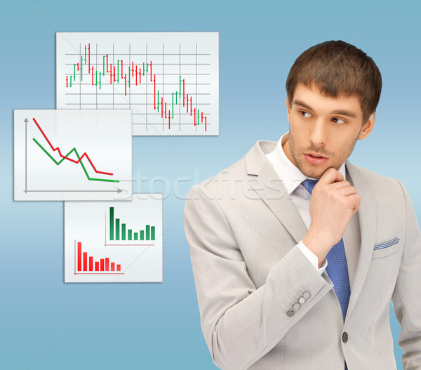 pensive man looking at forex charts Stock photo © dolgachov