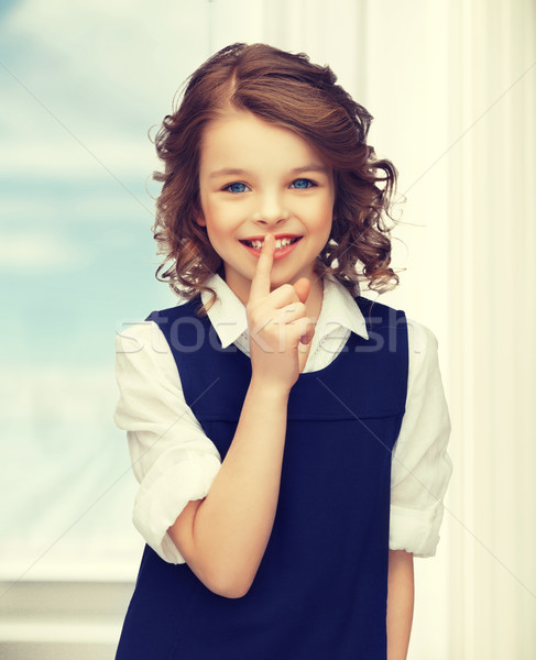 pre-teen girl showing hush gesture Stock photo © dolgachov
