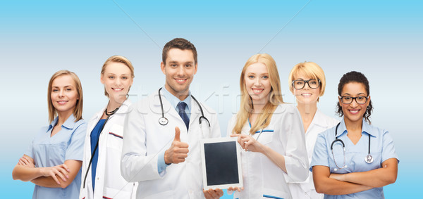 Stock photo: team or group of doctors with tablet pc computer