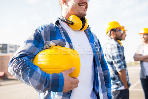 Construtor capacete de segurança edifício engrenagem Foto stock © dolgachov