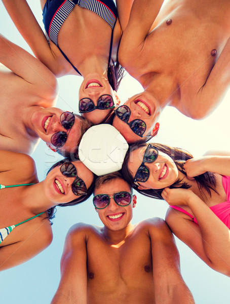 Uśmiechnięty znajomych kółko lata plaży przyjaźni Zdjęcia stock © dolgachov