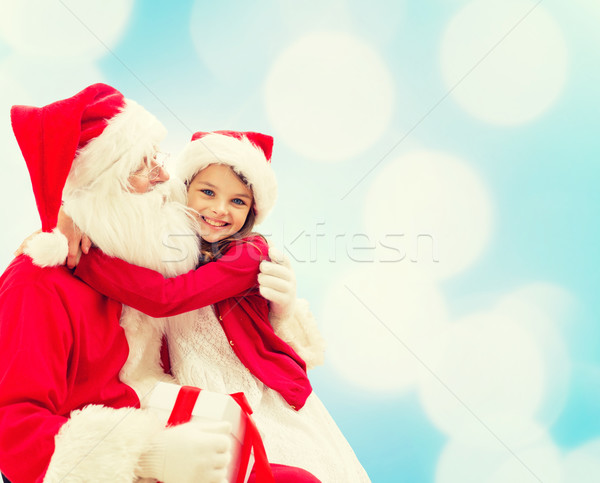 Mosolyog kislány mikulás ünnepek karácsony gyermekkor Stock fotó © dolgachov