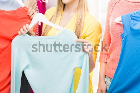 Stock photo: close up of male gay couple holding rainbow flag