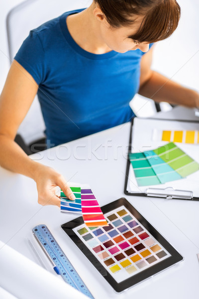 woman working with color samples for selection Stock photo © dolgachov