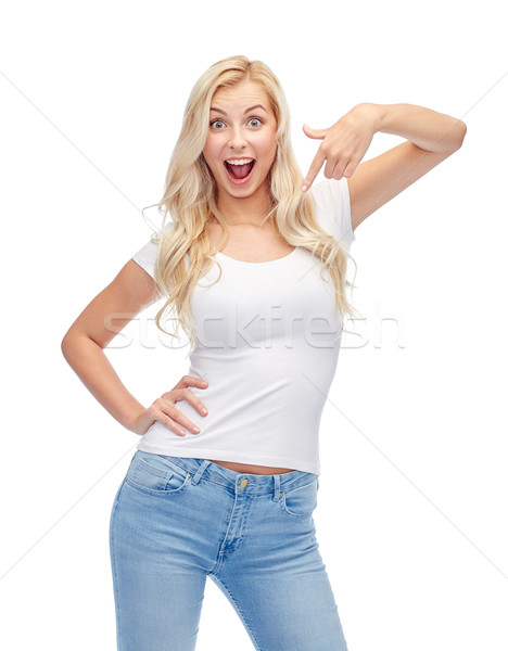 happy young woman or teenage girl in white t-shirt Stock photo © dolgachov