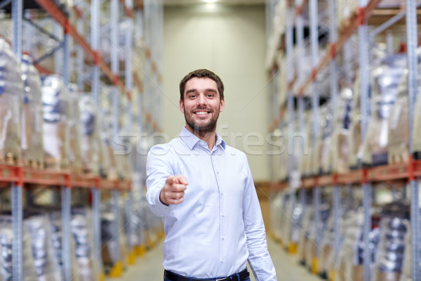 happy man at warehouse Stock photo © dolgachov