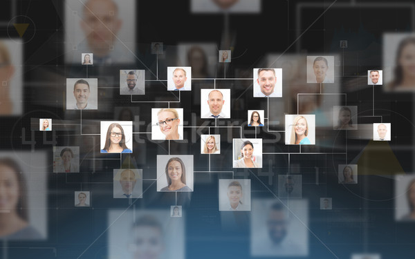 business contacts over dark blue background Stock photo © dolgachov