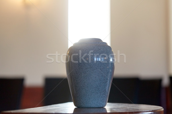 cremation urn on table in church Stock photo © dolgachov