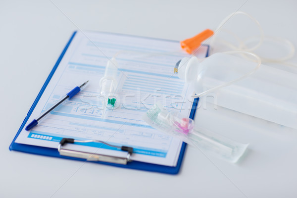 close up of medical report and drop counter Stock photo © dolgachov