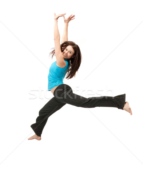 jumping sporty girl Stock photo © dolgachov