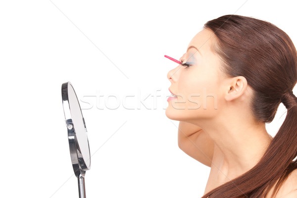 Belle femme peigne lumineuses photos femme miroir [[stock_photo]] © dolgachov