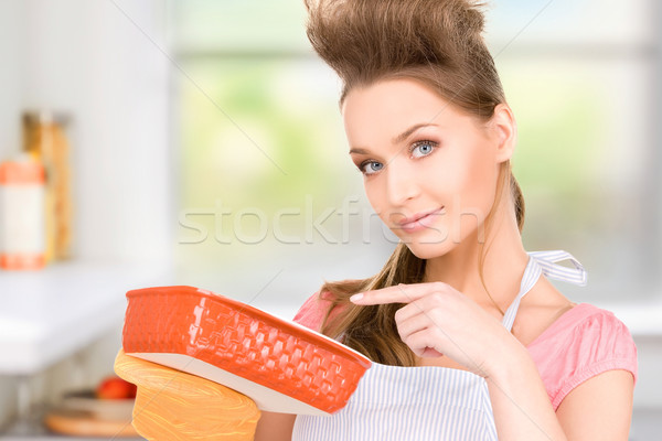 cooking housewife Stock photo © dolgachov