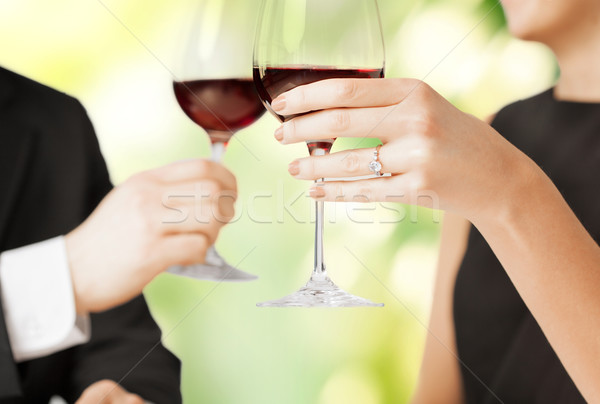 engaged couple with wine glasses Stock photo © dolgachov