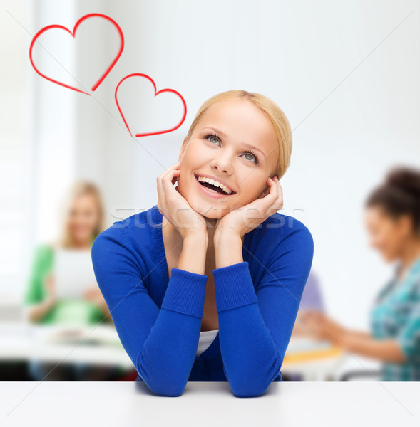 happy woman dreaming and laughing Stock photo © dolgachov