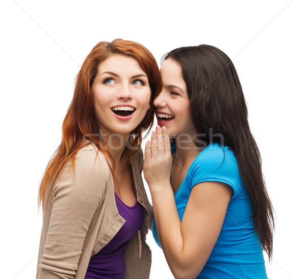 [[stock_photo]]: Deux · souriant · filles · chuchotement · potins · amitié