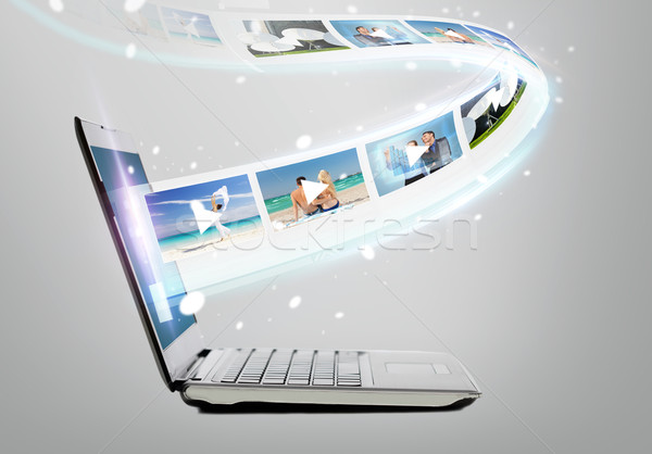 laptop computer with video on screen Stock photo © dolgachov