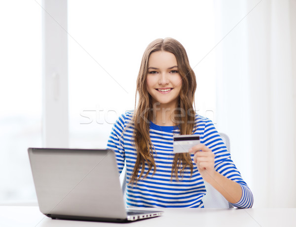 Sonriendo ordenador portátil casa tecnología bancario Foto stock © dolgachov