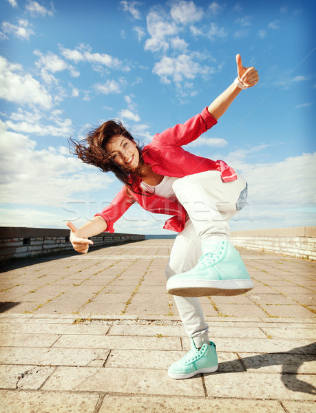 beautiful dancing girl in movement Stock photo © dolgachov