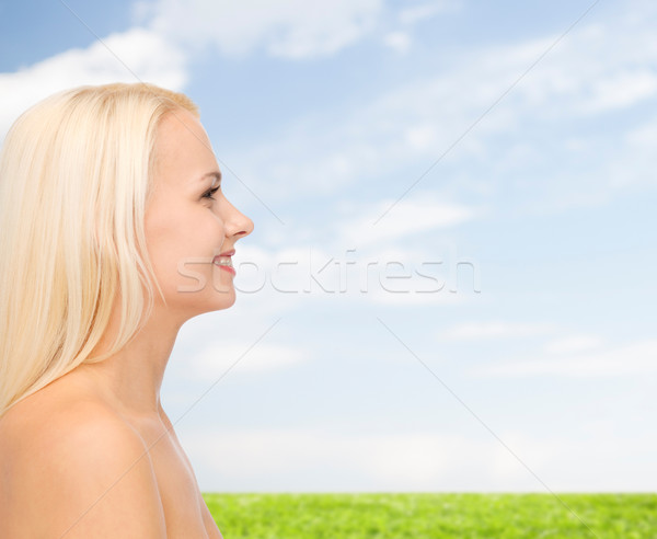 smiling young woman Stock photo © dolgachov