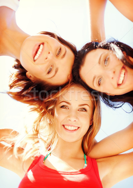 Ragazze facce guardando verso il basso estate vacanze vacanze Foto d'archivio © dolgachov