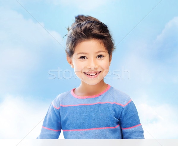 Little girl blue sky infância pessoas felicidade pequeno Foto stock © dolgachov