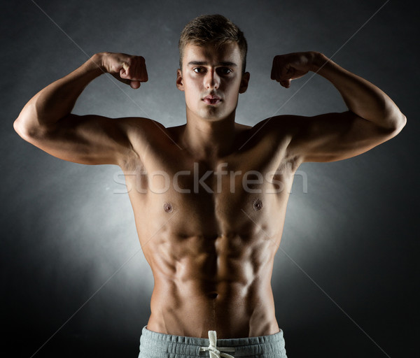 [[stock_photo]]: Jeune · homme · biceps · sport · bodybuilding