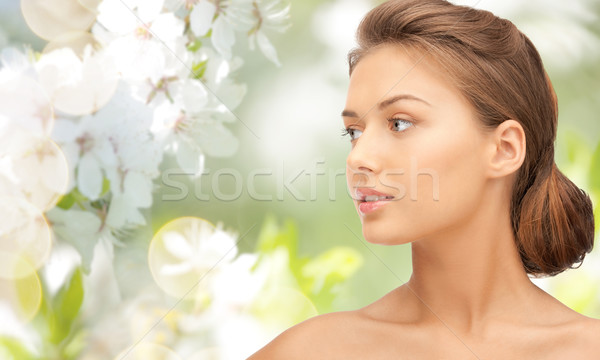 beautiful young woman face looking aside Stock photo © dolgachov