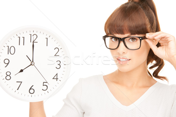 woman holding big clock Stock photo © dolgachov