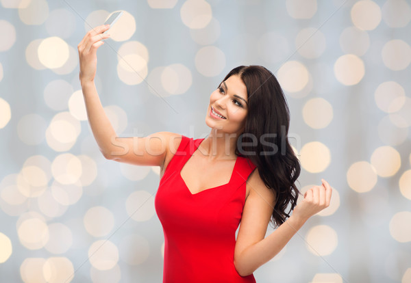 сексуальная женщина фотография смартфон люди праздников Сток-фото © dolgachov