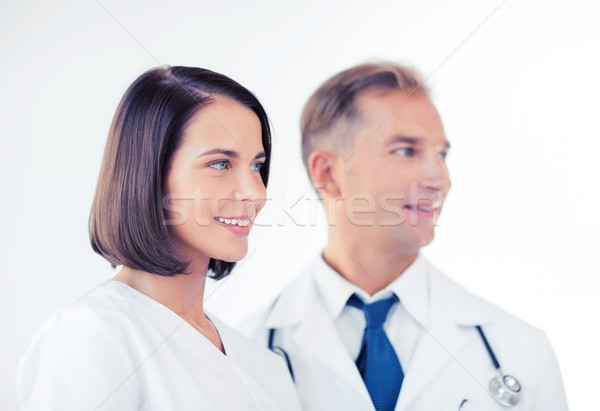 two doctors with stethoscopes Stock photo © dolgachov