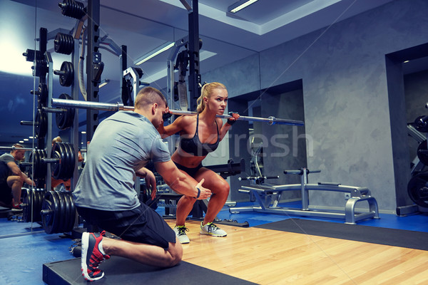 Foto stock: Hombre · mujer · bar · músculos · gimnasio · deporte