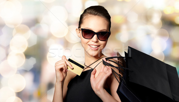 счастливым женщину кредитных карт продажи Сток-фото © dolgachov