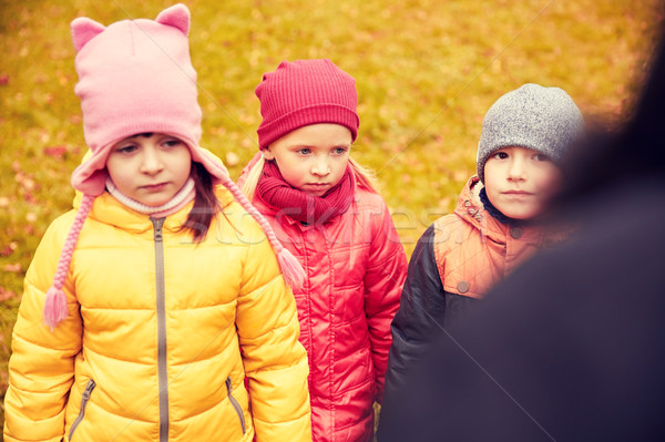 sad kids being blamed for misbehavior outdoors Stock photo © dolgachov