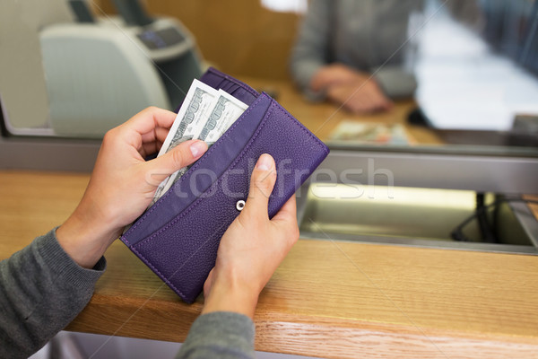 Stock photo: hands with money at bank or currency exchanger
