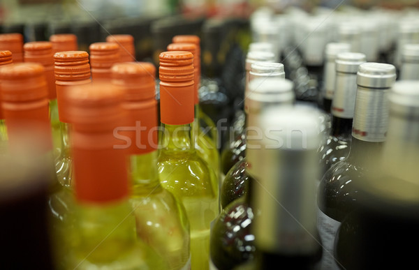 Közelkép üvegek szeszes ital bolt vásár alkohol Stock fotó © dolgachov