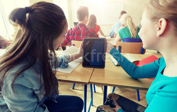 happy student girls with tablet pc at high school Stock photo © dolgachov