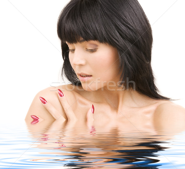 Uñas de color rojo Foto mujer agua cara pelo Foto stock © dolgachov