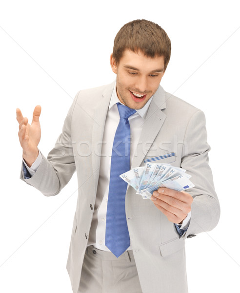 Jóképű férfi Euro pénz pénz kép üzlet Stock fotó © dolgachov