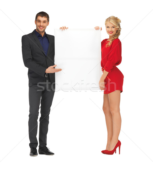 couple holding big blank board Stock photo © dolgachov