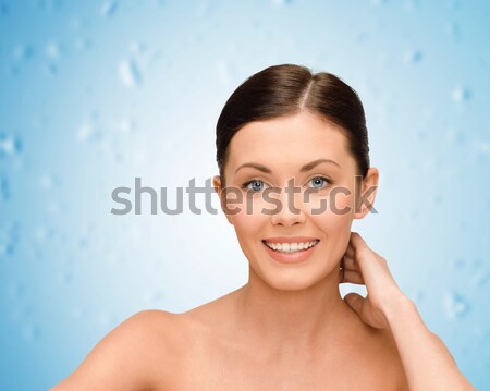 beautiful woman with moisturizing creme drop Stock photo © dolgachov