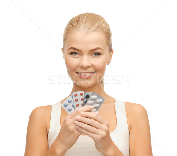 Jeune femme pilules photos variété femme santé [[stock_photo]] © dolgachov