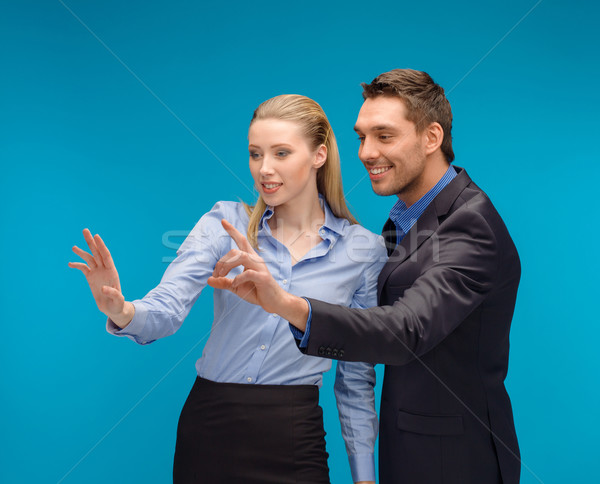 woman and man working with virtual screen Stock photo © dolgachov