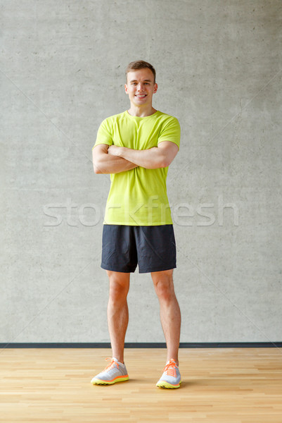 Sorridente homem ginásio esportes fitness estilo de vida Foto stock © dolgachov