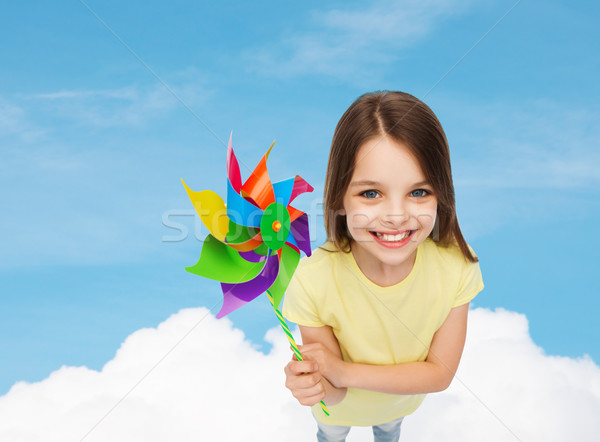 [[stock_photo]]: Souriant · enfant · coloré · moulin · à · vent · jouet · éducation