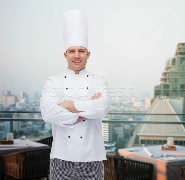 happy male chef cook with crossed hands Stock photo © dolgachov